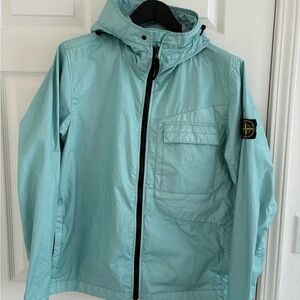 Stone Island Light Blue Jacket with Logo Patch
